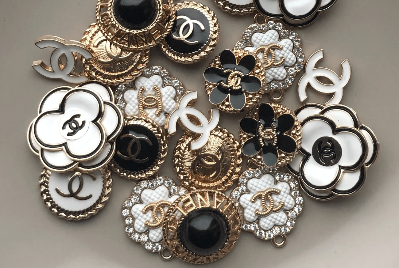 Vintage Chanel Buttons that will be repurposed into into pendant charms and hung on gold-filled chains. 